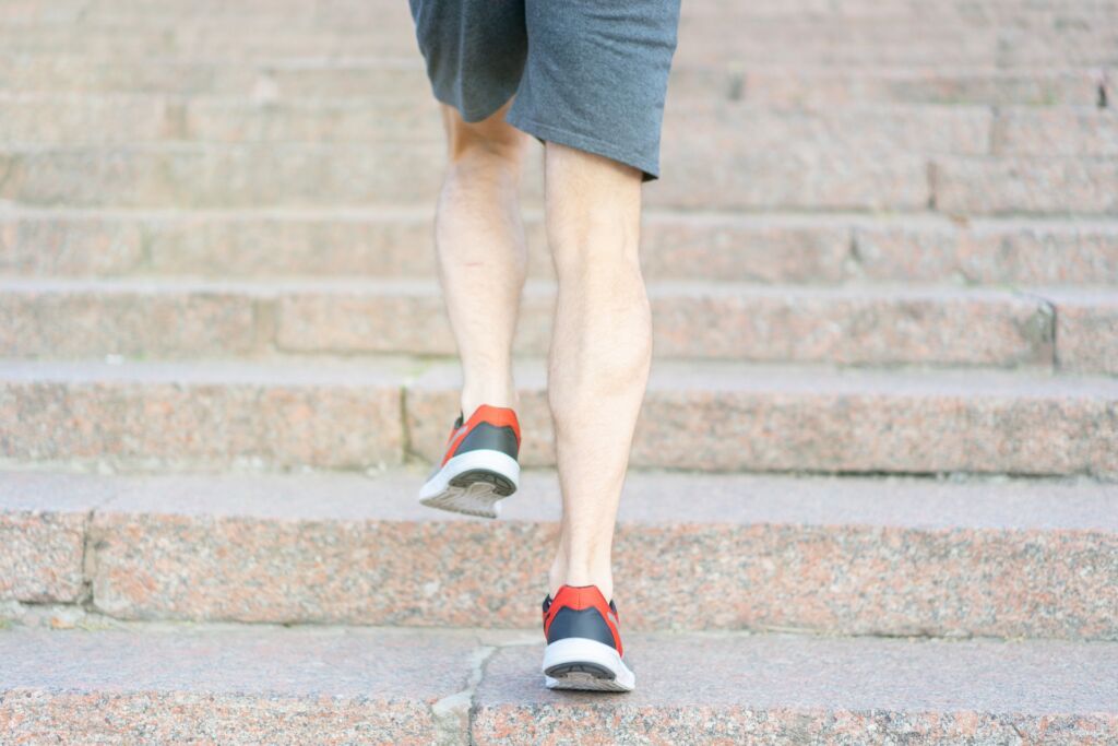 male running up stairs