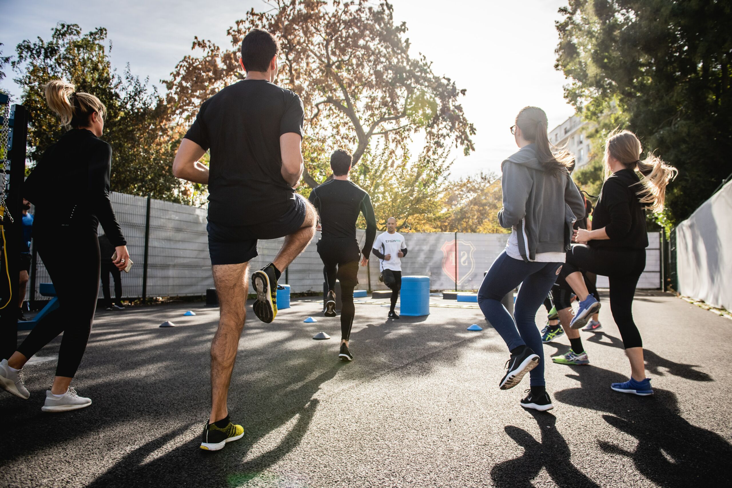 group workout class that is outdoors.