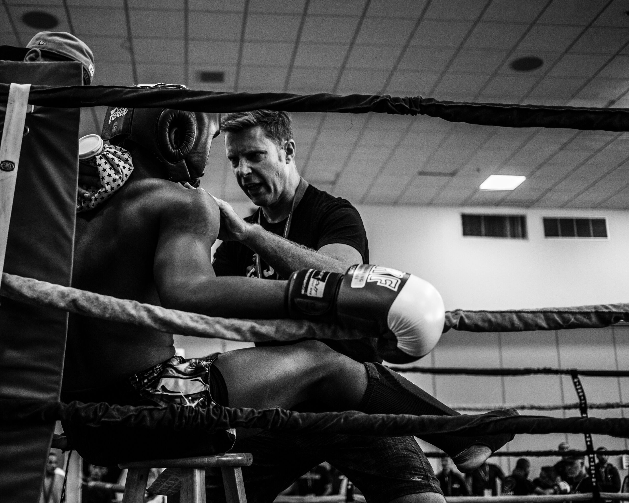 boxer receiving motivation from a coach