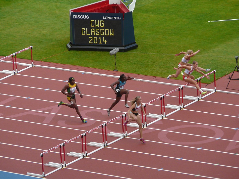 Woman hurdles