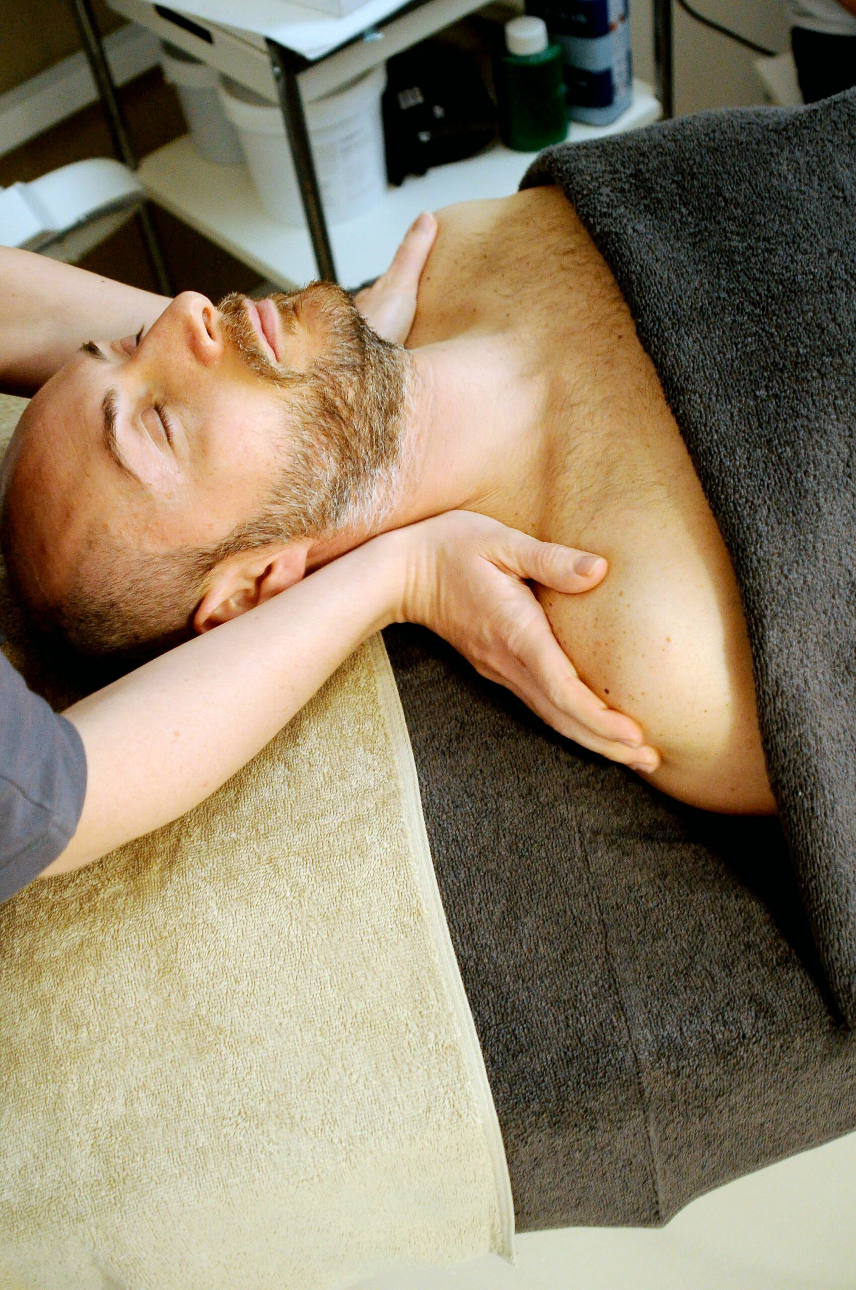 man getting a massage looking relaxed